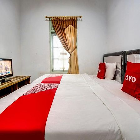 Отель Oyo 90771 Mess 19 Syariah Бандар-Лампунг Экстерьер фото